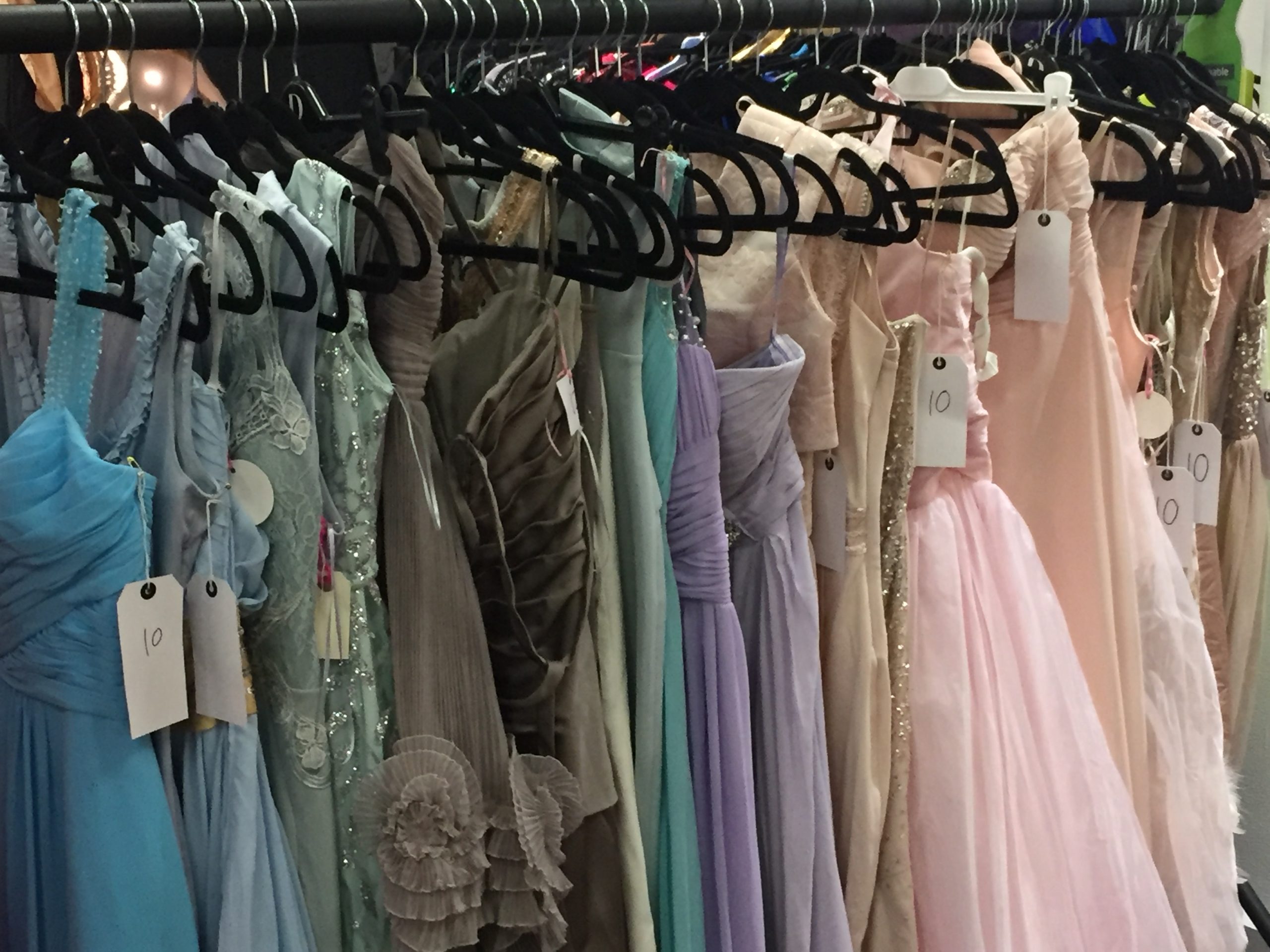 rail of prom dresses